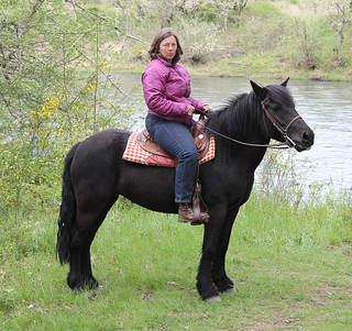 Margie on a trail ride May 2013